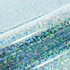 Close-up of a roll of glittery vinyl with multicolored sequins on a light blue background.