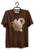 Brown t-shirt with a graphic design on a hanger