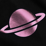 Pink planet with rings on a black background