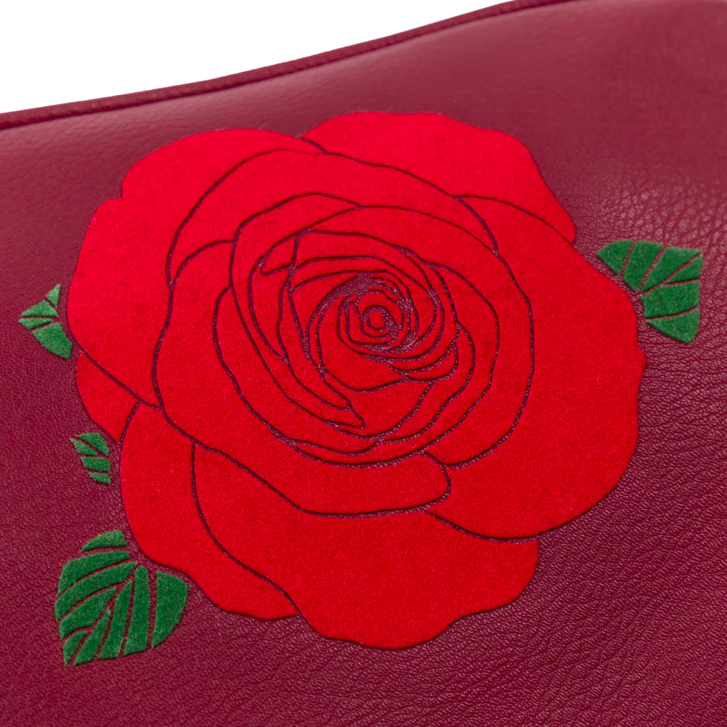 Red rose design on a maroon background