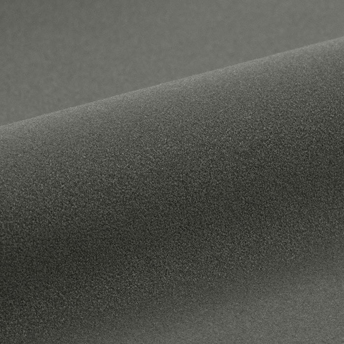 Close-up of a textured dark gray vinyl roll