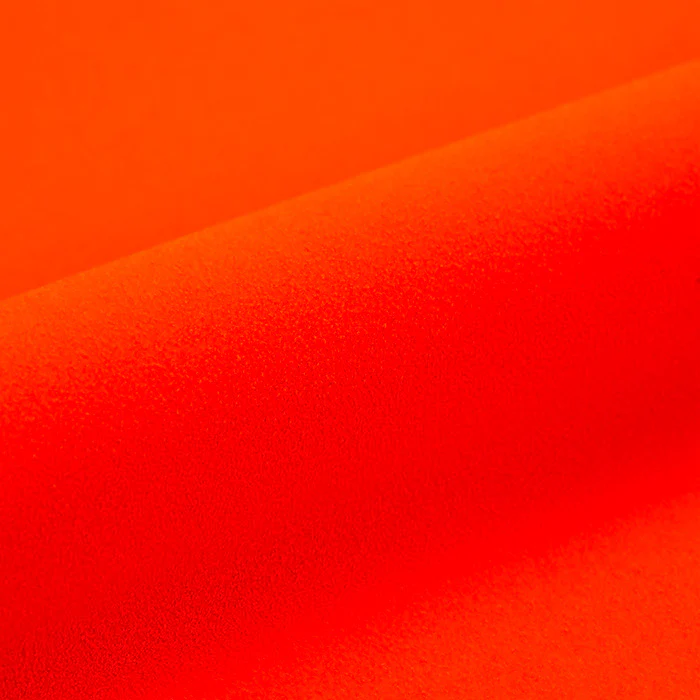 Close-up of textured orange vinyl roll