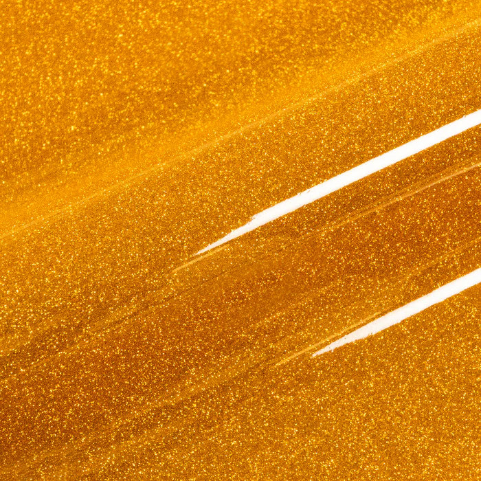 Close-up of a gold glittery vinyl roll
