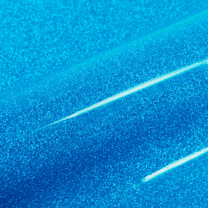 Close-up of a blue textured vinyl roll