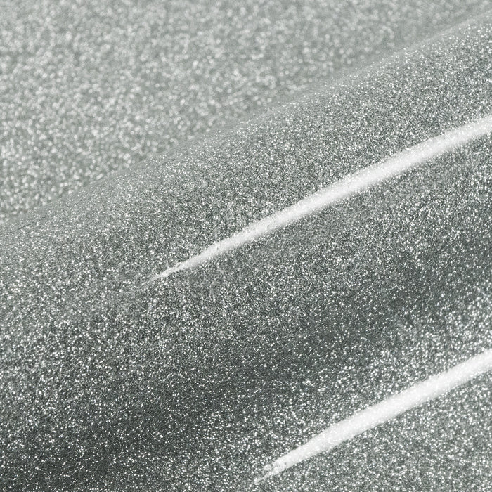 Close-up of a textured silver vinyl roll