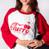 Person wearing a red and white shirt with 'Cherry Lip Gloss' design.