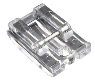 Clear plastic component with metal fastener on a white background