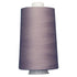Large spool of purple thread on a white background