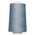 Large spool of blue thread on a white background