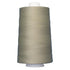 Spool of beige thread on a white background