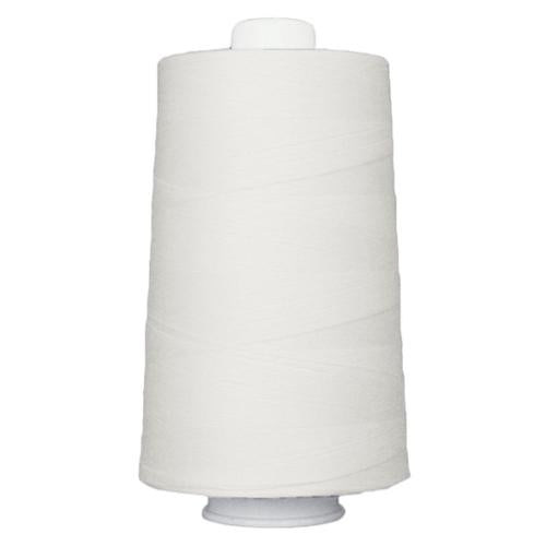 White spool of thread on a white background