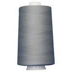 Large spool of gray thread on a white background