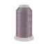 Spool of purple thread on a white background