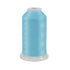 Spool of light blue thread on a white background