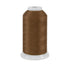 Brown spool of thread on a white background