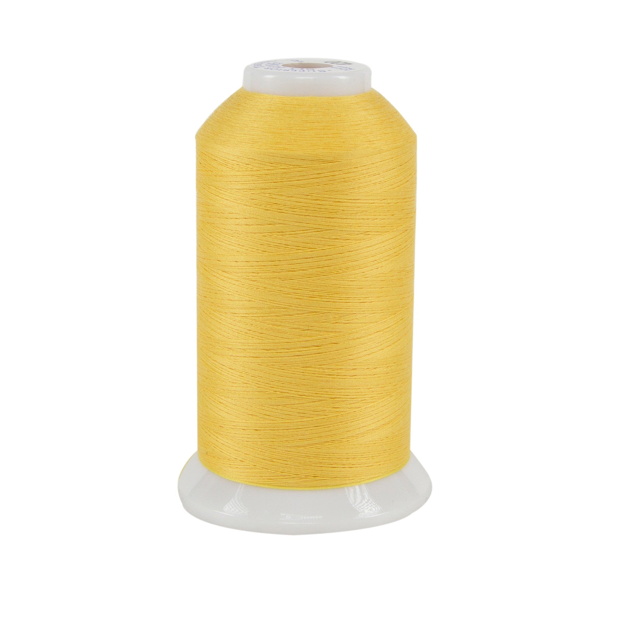 Spool of yellow thread on a white background