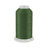 Spool of green thread on a white background
