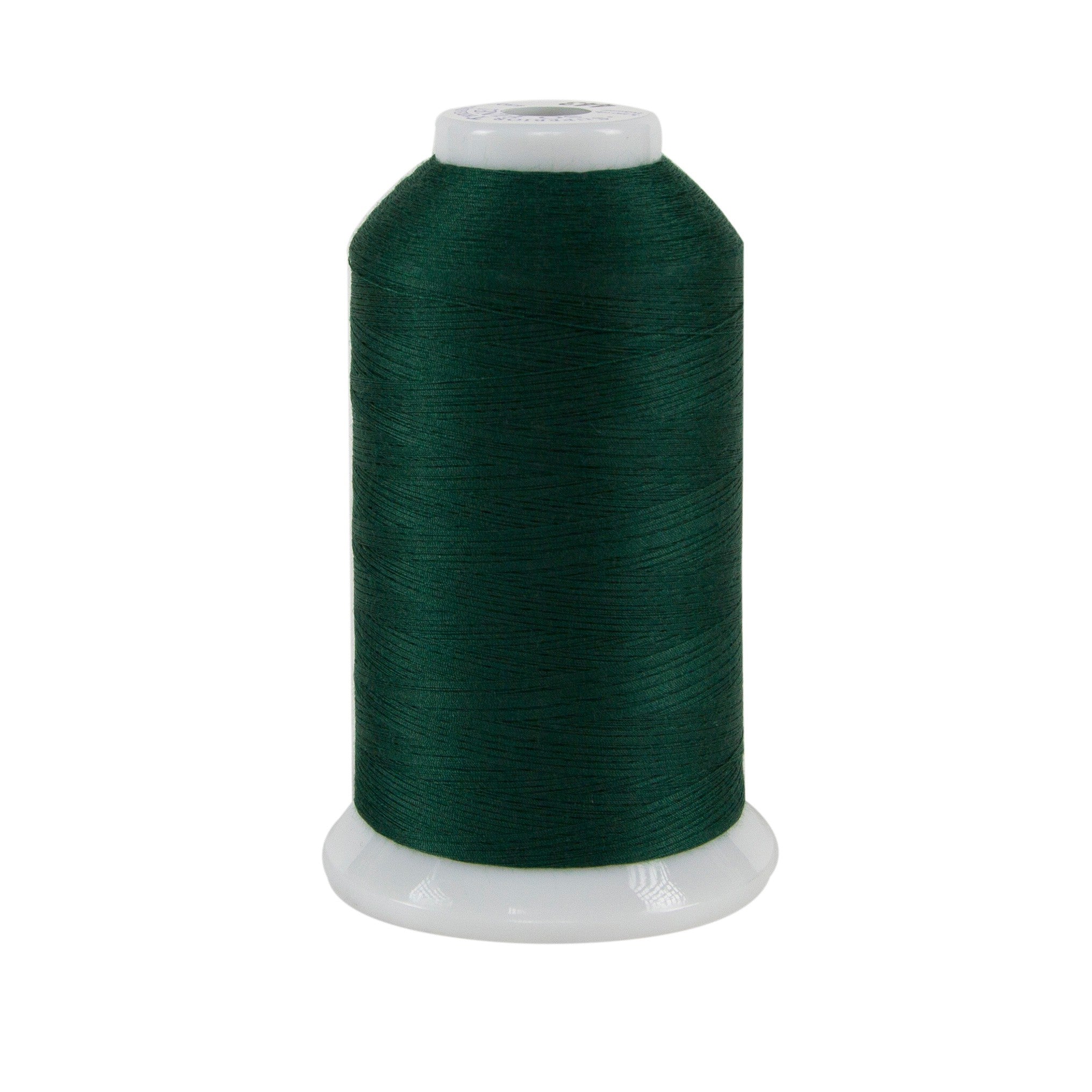 Spool of green thread on a white background