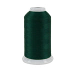 Spool of green thread on a white background