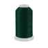 Spool of green thread on a white background
