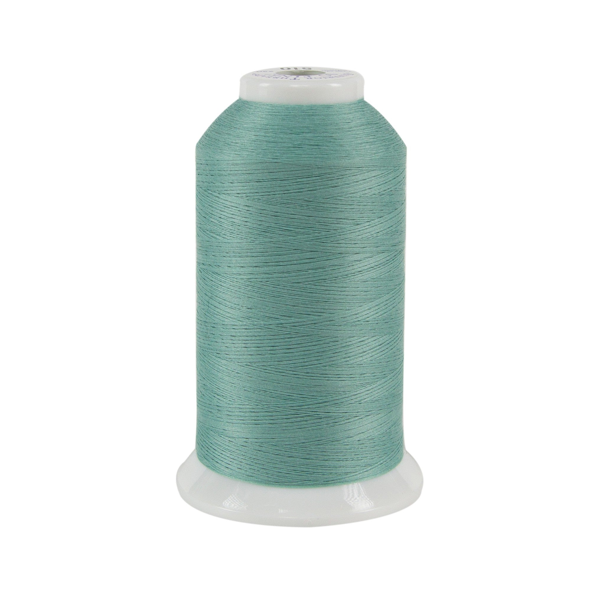 Spool of teal thread on a white background