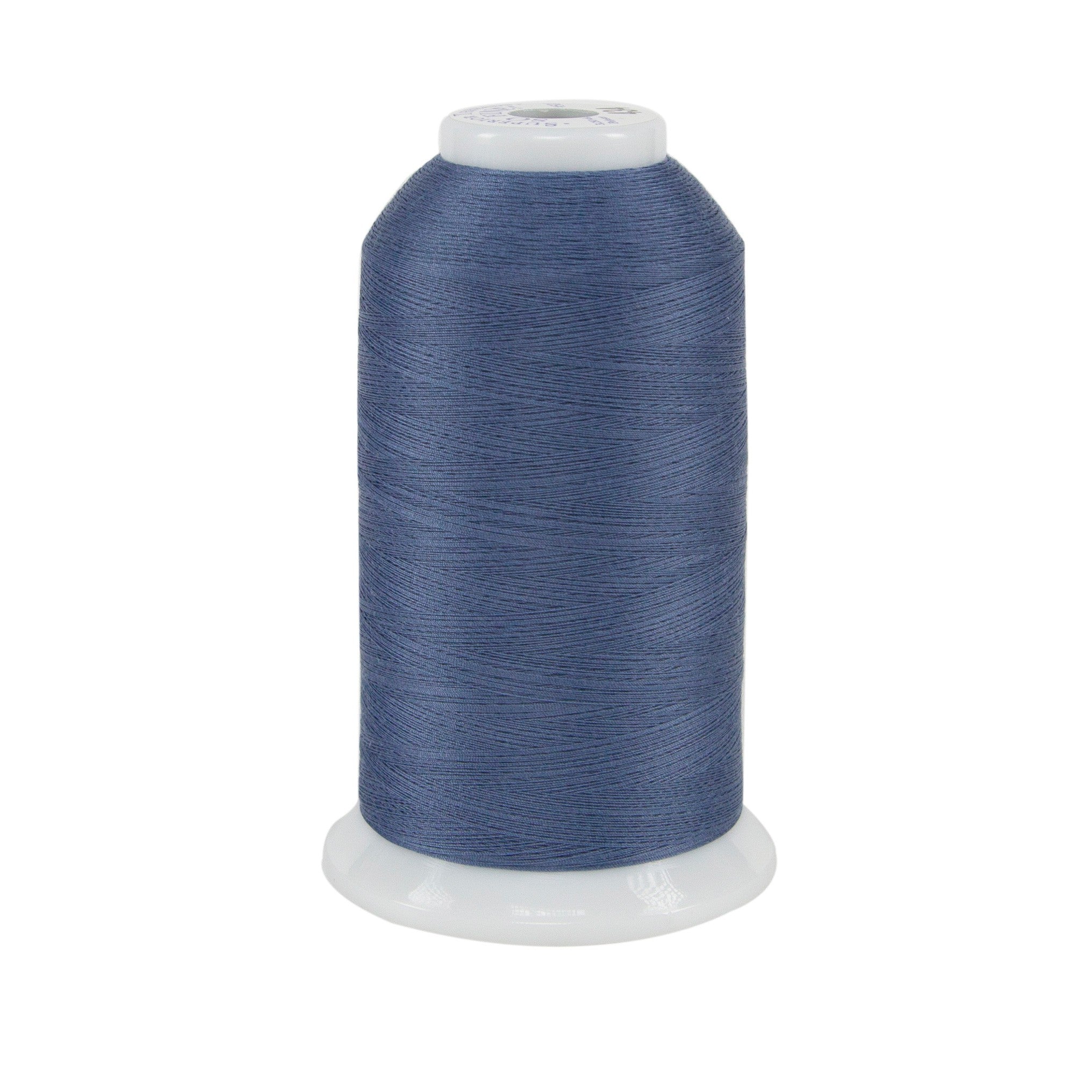 Spool of blue thread on a white background