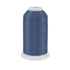 Spool of blue thread on a white background