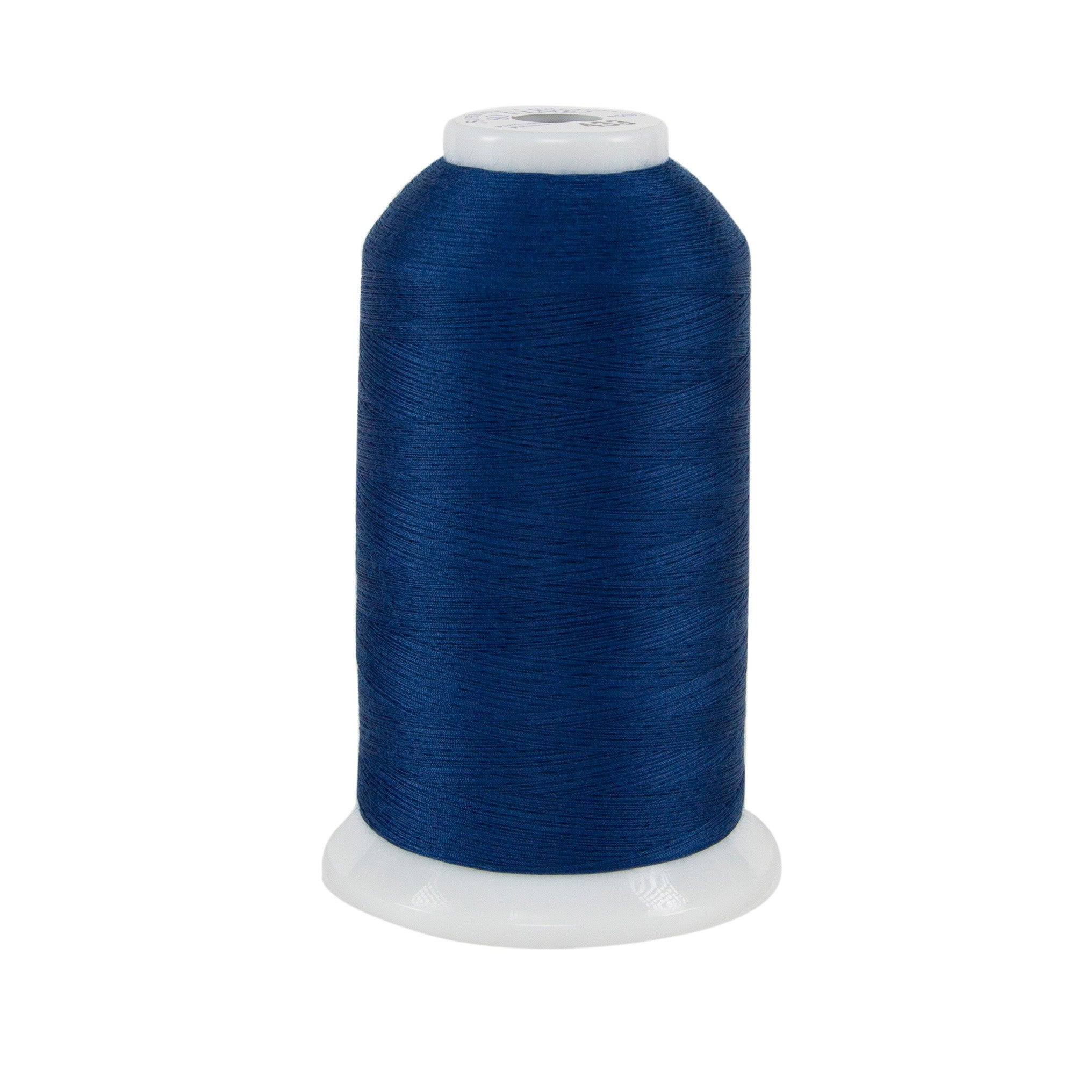 Spool of blue thread on a white background