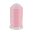 Spool of pink thread on a white background