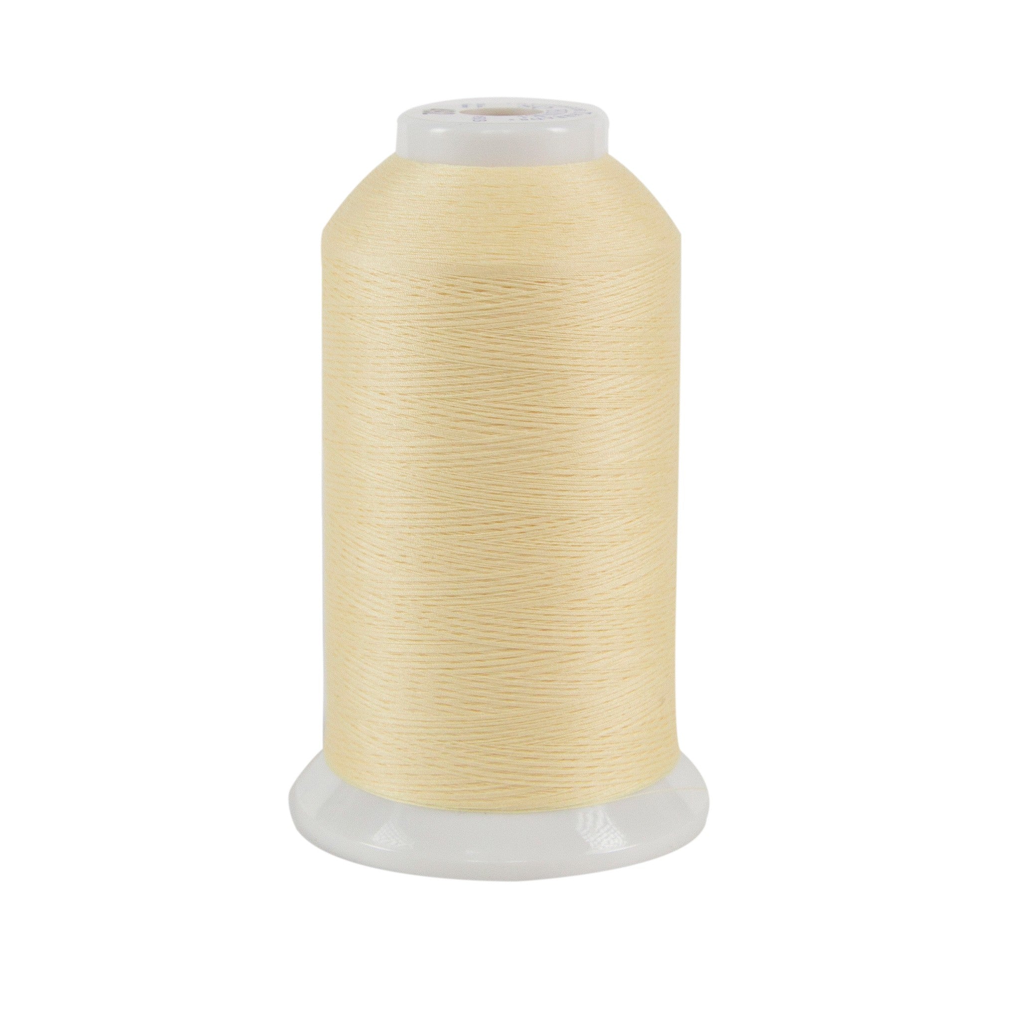 Spool of pale yellow thread on a white background