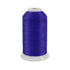 Spool of purple thread on a white background