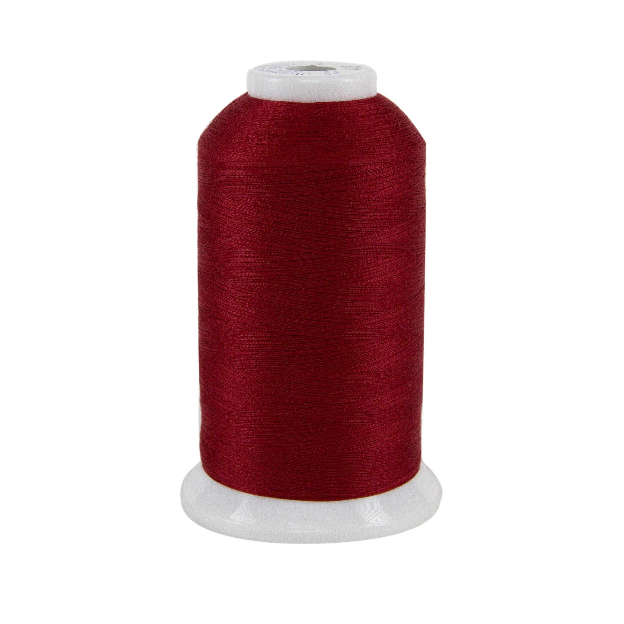 Spool of red thread on a white background