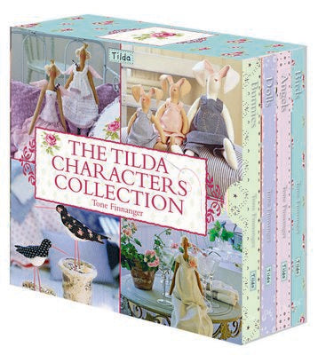 Box set of 'The Tilda Characters Collection' with images of dolls and decorative items on a white background.