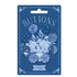 Packaging of decorative buttons with floral and animal designs on a blue background