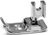 A polished silver metal sewing or embroidery foot pedal attachment, shown on a plain white background.