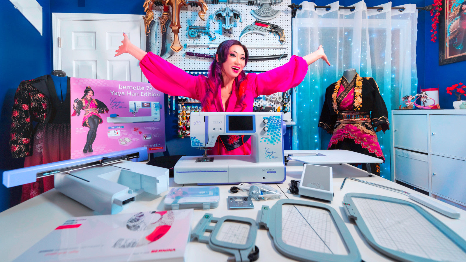 image of yaya han showing off the Bernette b79 Yaya Han Special Edition Sewing and Embroidery Machine in a room with various embroidery and cosplay supplies