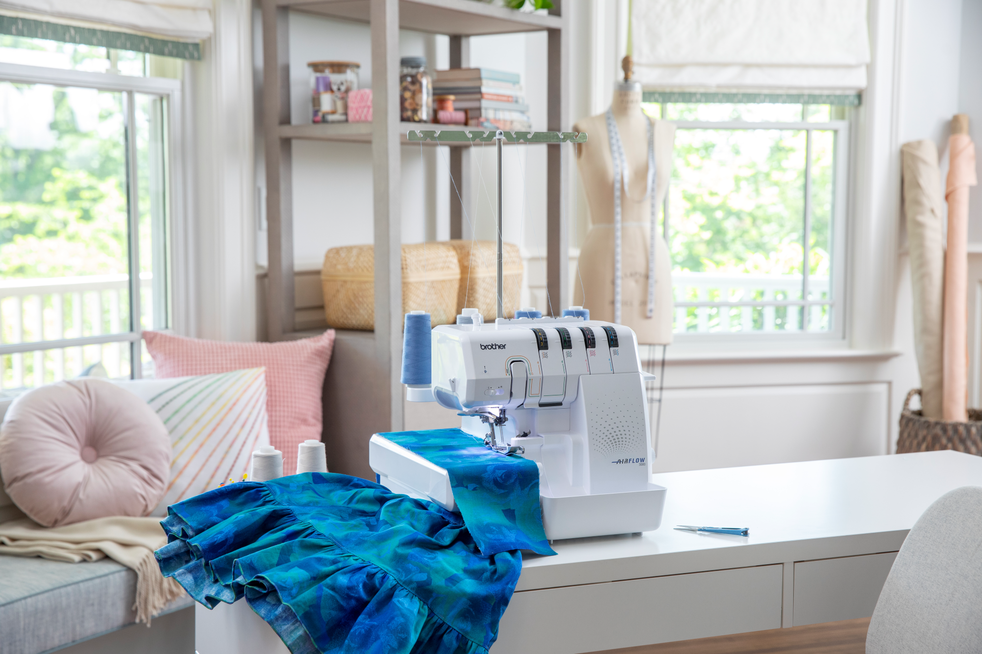 image of the Brother AIRFLOW 3000 Air Serger with sewing example on a table