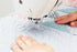 close up image of the JUKI HZL-NX7 Kirei Professional Quality Sewing and Quilting Machine being used to sew an item