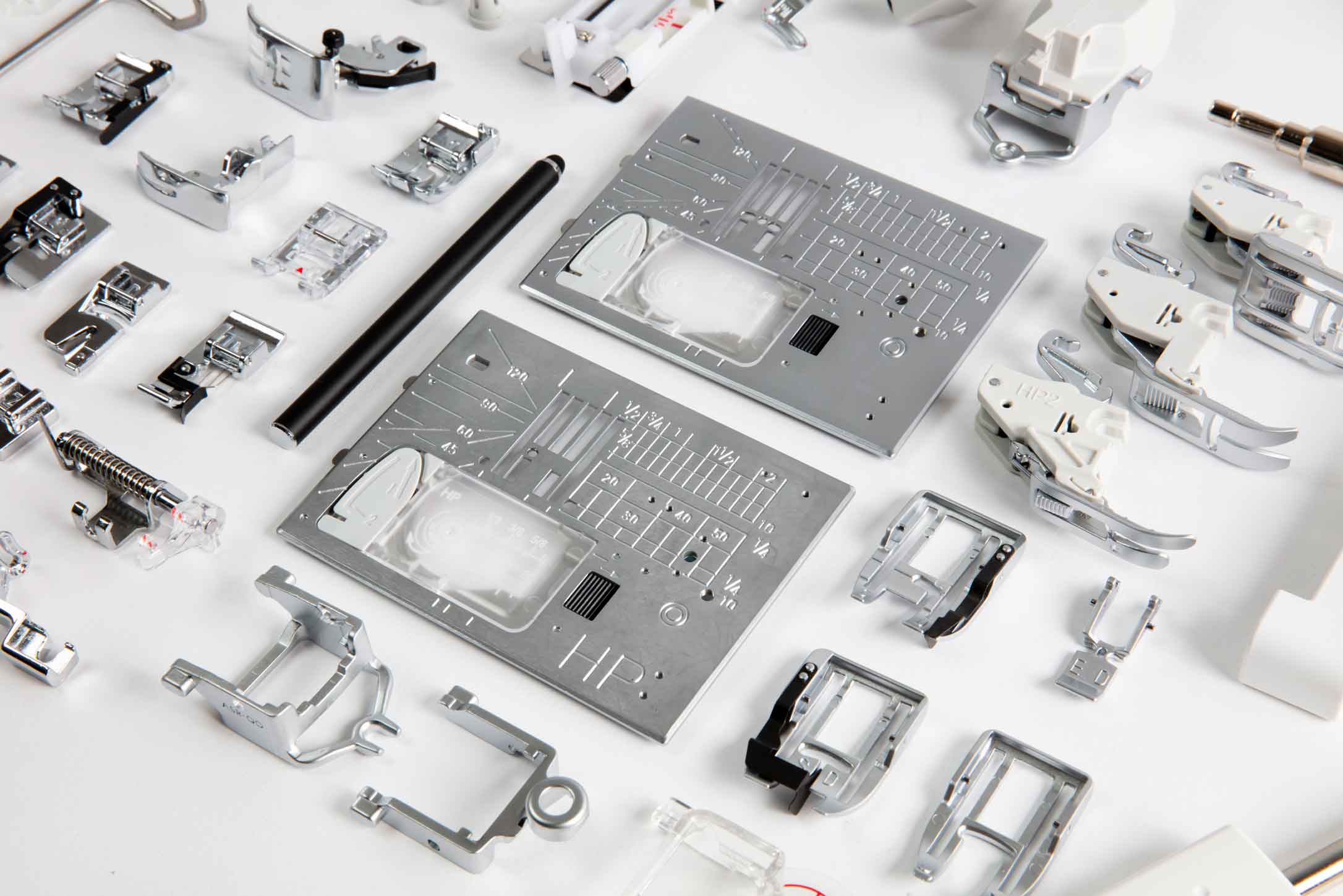 image of some of the Janome Continental M17 Sewing and Embroidery Machine accessories