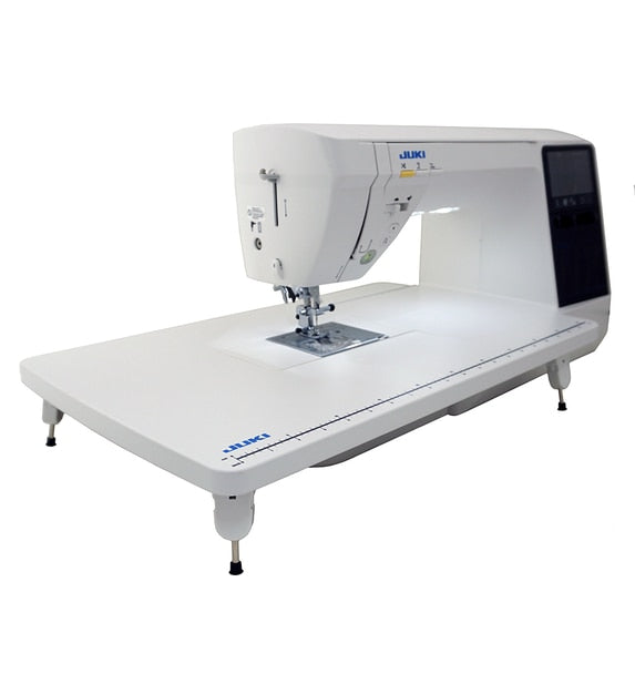 image of the JUKI HZL-NX7 Kirei Professional Quality Sewing and Quilting Machine with wide table attached
