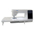 angled image of the JUKI HZL-NX7 Kirei Professional Quality Sewing and Quilting Machine with a table attachment