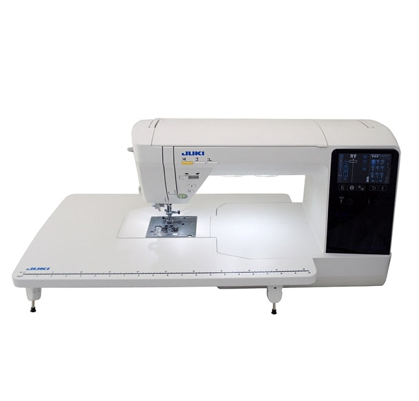 front facing image of the JUKI HZL-NX7 Kirei Professional Quality Sewing and Quilting Machine with wide table attached