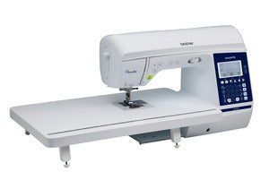angled image of the Brother Pacesetter PS700 eight point three by four point one Sewing and Quilting Machine with long table