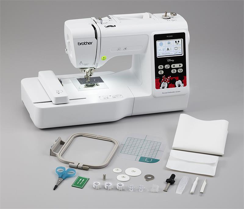 image of the brother pe550d four by four embroidery machine and some of the included accessories