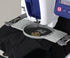 close up image of the Brother Persona PRS100 eight by eight 1 Needle Embroidery Machine with a round frame set attached
