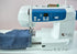 image of the EverSewn Sparrow X2 Sewing and Embroidery Combo Machine being used on jeans