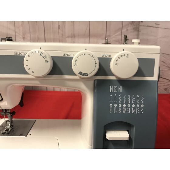 close up image of the Janome HD1400 Sewing Machine stitch chart