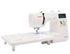 angled image of the Janome JW8100 Sewing and Quilting Machine with table attached