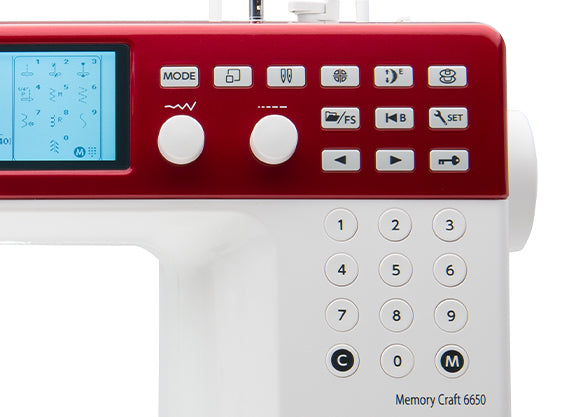 close up image of the Janome Memory Craft MC6650 Sewing and Quilting Machine buttons