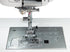 close up image of the Janome Memory Craft MC6650 Sewing and Quilting Machine needle plate